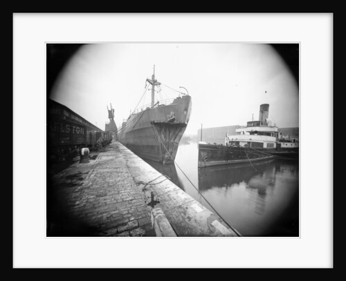 The 'Dotterel' (Br, 1936) alongside berth at Southampton with a damaged bow, slightly distant. The paddle steamer 'Portsdown' (1928) is berthed close by by unknown