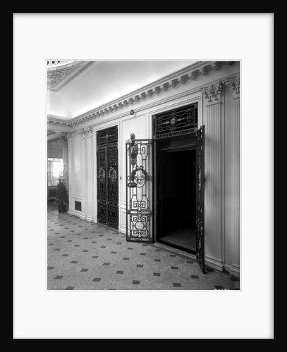 Passenger elevators in the Grand Entrance on the 'Aquitania' (1914) by Bedford Lemere & Co.