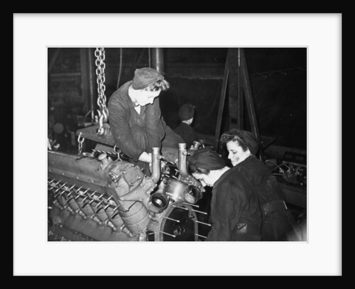 A WREN dismantling a large marine engine by unknown