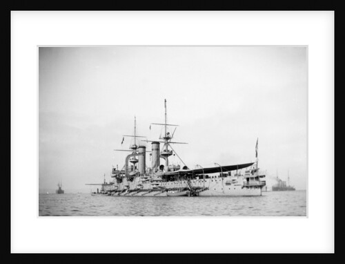 Battleship HMS 'Triumph' (1903) at anchor with awning aft by unknown