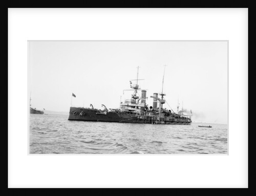 Battleship HMS 'Triumph' (1903) at anchor with awning aft by unknown