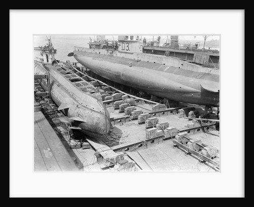 HM submarine D3 (1910) in floating dock at Harwich. by unknown