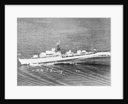 Destroyer HMS 'Daring' (1949) under way with crew in review order manning the ship by unknown
