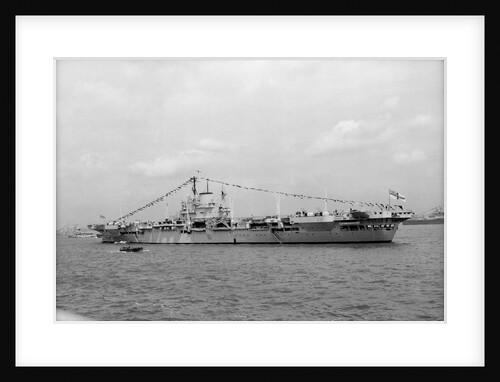 Aircraft carrier HMS 'Illustrious' (1939) on 15th June 1953, anchored in Line F at Spithead for the Coronation Review. Dressed overall by unknown