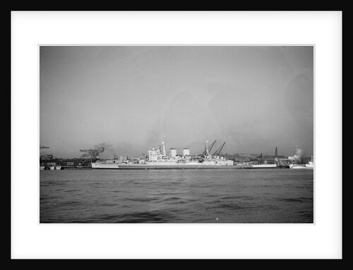 Battlecruiser HMS 'Renown' (1916) in 1945 alongside at Devonport, prior to being laid up. In the left background is the incomplete carrier 'Terrible' by unknown