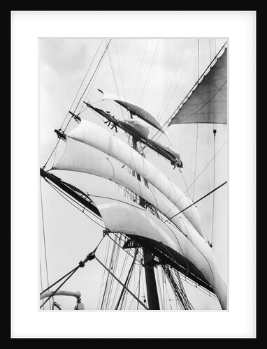 High aloft, taking in sail as the storm increases by Alan Villiers