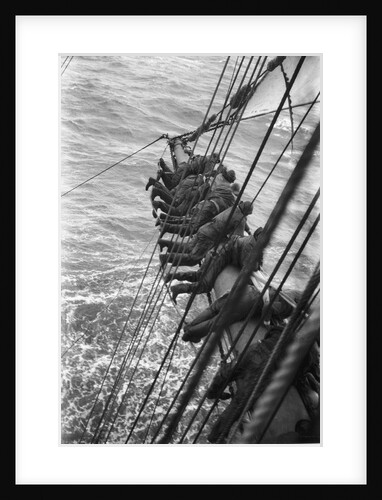 Making the main sail fast near Cape Horn, swaying on the footrope by Alan Villiers
