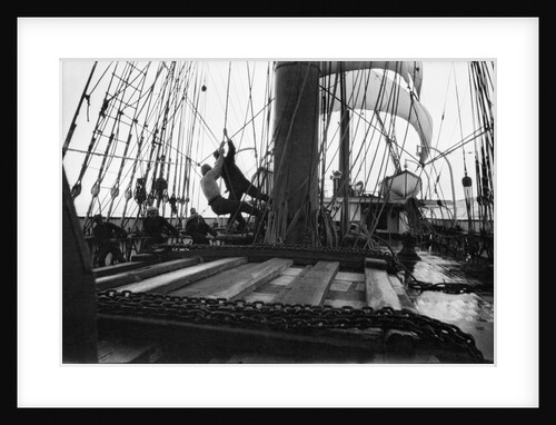 Hauling on the brace at the main mast by Alan Villiers