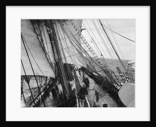Unbending a topsail by Alan Villiers