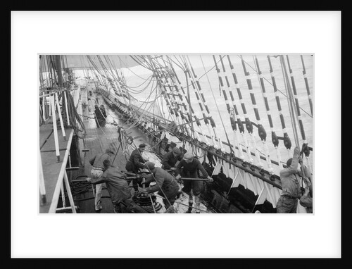 At the capstan, the sea breaking on board by Alan Villiers