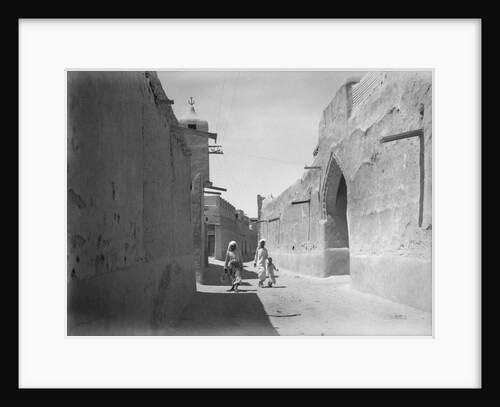 Kuwait street with an ornate doorwary details by Alan Villiers