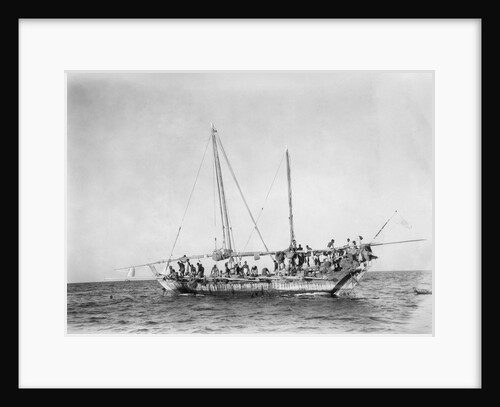 A crowded Kuwaiti pearling shu'i during a break from diving by Alan Villiers