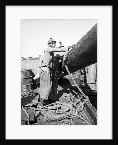 Ismael, a famous Kuwaiti musician, working on board the 'Triumph of Righteousness' by Alan Villiers