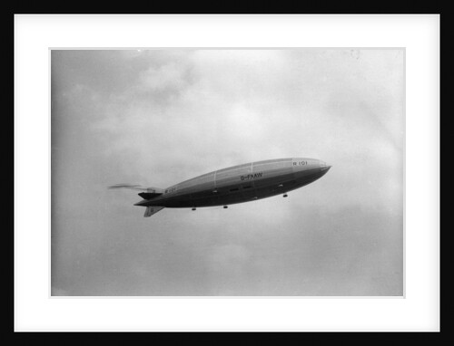 Photograph of rigid airship 'R101' (1929) in flight over Hendon by unknown