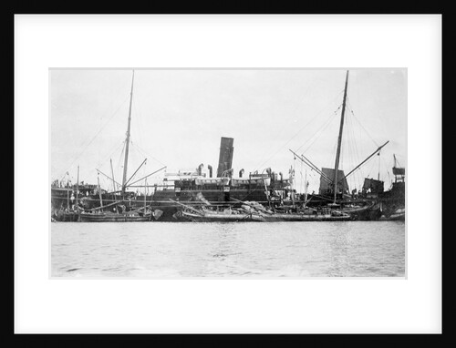 'Sakura Maru' (Ja, 1887) at moorings, junks alongside by unknown