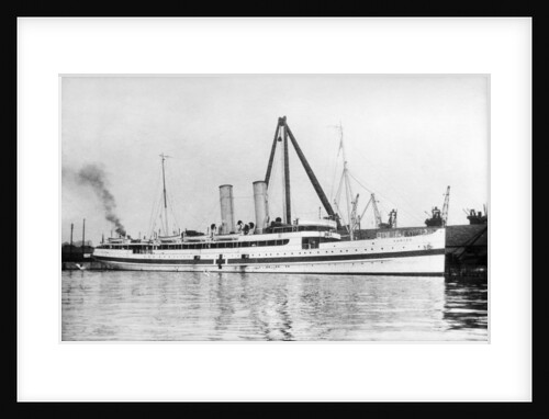 The cross channel turbine steamer 'Munich' (Br 1908) as a hospital ship at quayside, under sheerlegs by Anonymous