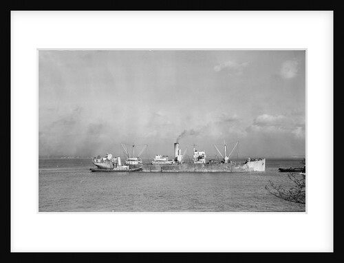 A starboard broadside view of 'Empire Derwent' (1930) under tow by Unknown