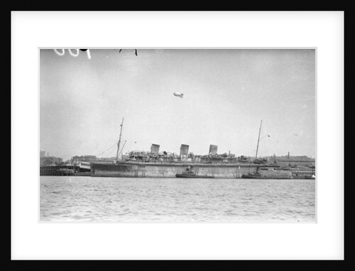 'Monarch of Bermuda' (1931) alongside in the River Mersey in 1942-1943, probably refitting as a mercantile LSI(L) by unknown