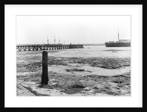 A view looking from the shore towards Shotley pier at low tide by Smiths Suitall Ltd.