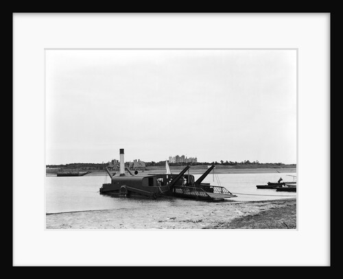 The steam chain ferry 'Lady Quilter' (1894) on the Felixstowe side of the River Deben, with Bawdsey Manor in the background by Smiths Suitall Ltd.