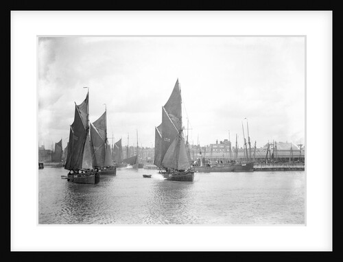 The sailing trawlers 'LT325', 'LT653' and 'LT37' leaving the outer harbour at Lowestoft, Suffolk, taken from the end of the breakwater by Smiths Suitall Ltd.
