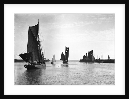 The trawler 'Roma' (1906) [LT410] with an unidentified trawler sailing out of the outer harbour at Lowestoft, Suffolk by Smiths Suitall Ltd.