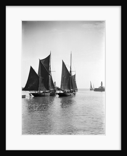 The trawler 'Refuge' (1896) [LT715] under sail, close to the trawler 'Greyhound' (1905) [LT404], in the outer harbour outward bound at Lowestoft, Suffolk by Smiths Suitall Ltd.