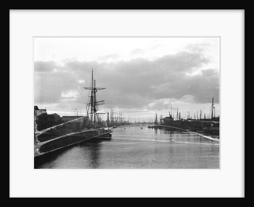 A view of the inner harbour at sunset from the harbour entrance west of the road bridge at Lowestoft, Suffolk by Smiths Suitall Ltd.