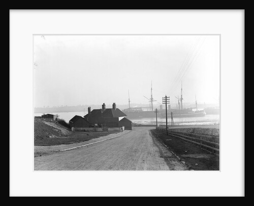 A view looking over the foreshore of Shotley Gate across the River Stour towards Harwich with the Bristol Arms on the left and the 'Ganges' training ships by Smiths Suitall Ltd.