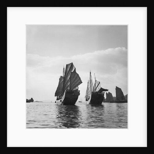 Two Yeungkong fisher type junks under sail at Aberdeen, Hong Kong by David Watkin Waters