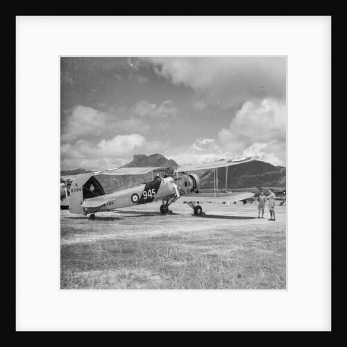 Fairey Swordfish I torpedo bomber reconnaissance biplane aircraft K8386, code 945, of 824 Squadron Fleet Air Arm, on Kai Tak airfield, Hong Kong by David Watkin Waters