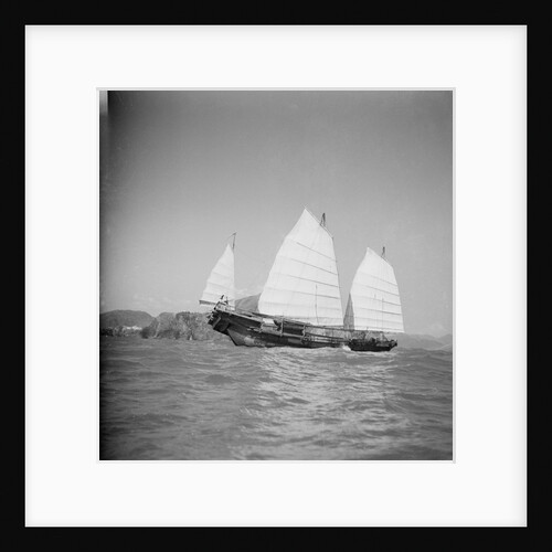 A starboard side view of a Hong Kong fisher d.w. type junk under sail at Hong Kong by David Watkin Waters