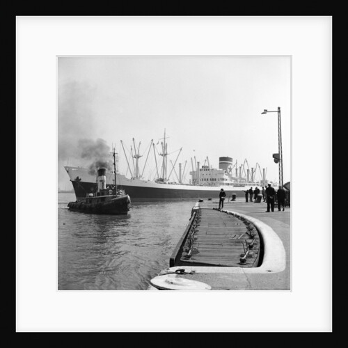 The Blue Star Line's 'Auckland Star'entering the King George V Dock in April 1964, assisted by the tug 'Atlantic Cock'. The 'Auckland Star' remained in service until 1978. by Grierson Collection