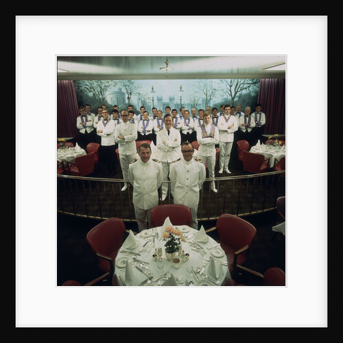 The restaurant staff on the Union-Castle cruise ship 'Windsor Castle' gather for a group photograph by Marine Photo Service