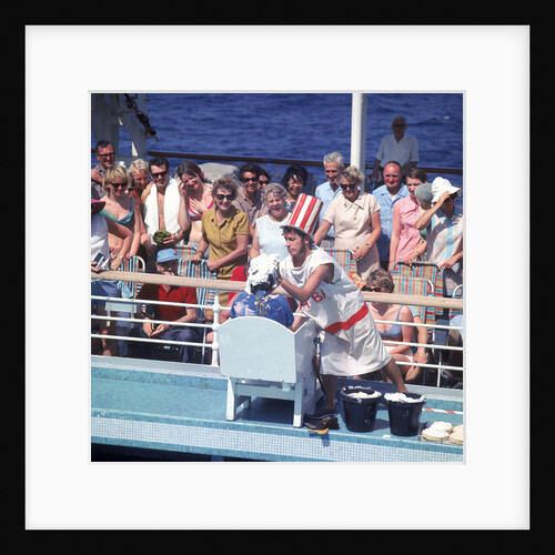 Comic hijinx aboard an unspecified cruise ship keeps the passengers entertained during the voyage - perhaps a variant of the Crossing the Line (the Equator) ceremony? by Marine Photo Service