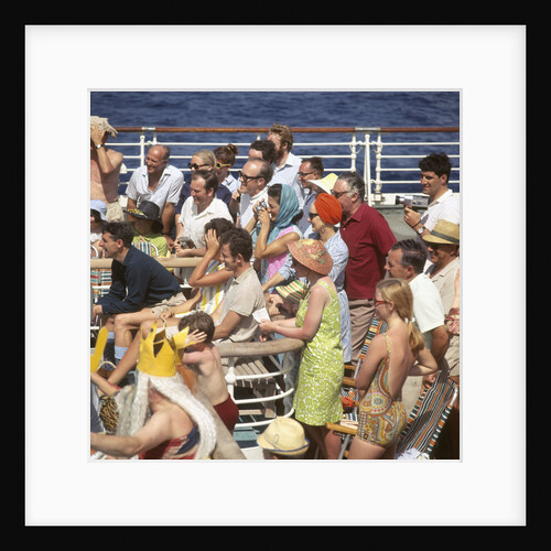 Interested passengers, young and old, enjoy on-deck entertainment aboard an unspecified cruise liner by Marine Photo Service