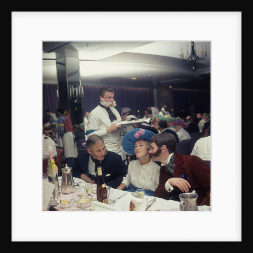 A Victorian themed dinner aboard an unspecified cruise liner, with period costume and fake 'lamb chops' facial hair aplenty, provides much merriment for passengers by Union Castle Line Collection