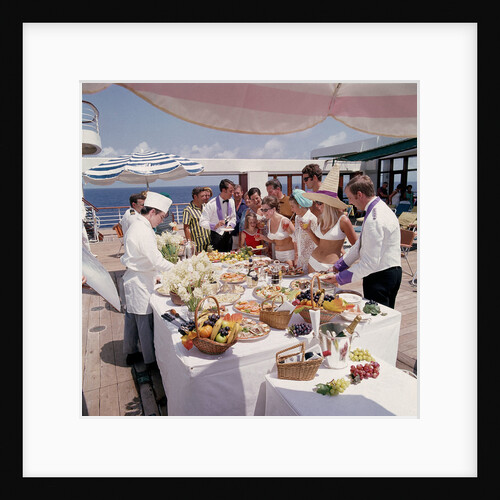 Fine weather allows passengers to enjoy a casual buffet on deck - no need to dress for dinner on this occasion! by Union Castle Line Collection