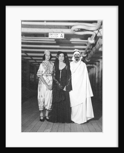 Passengers dress up in Middle Eastern costume for an obscure tableau aboard an unspecified cruise ship by Marine Photo Service