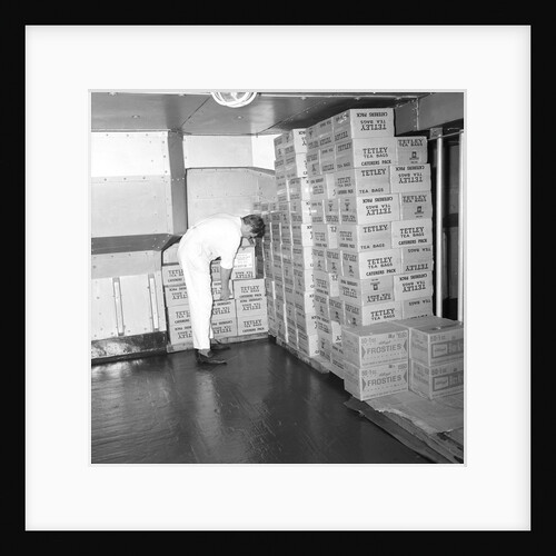 A storeroom containing boxes of Tetley's tea bags and Kellogg's Frosties, onboard 'Iberia' (1954) by Marine Photo Service