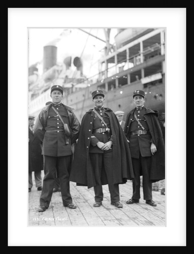 Gendarmes holding back the throng of Muslim men at quayside, Algiers, Algeria, 1925 by Marine Photo Service