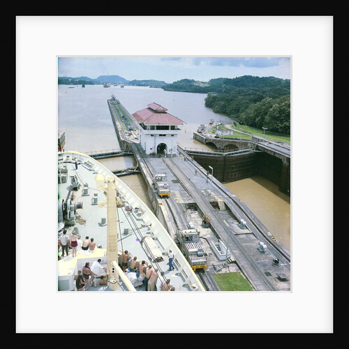 A view from the bridge of 'Gripsholm' (1957) or 'Kungsholm' (1966) of the Pedro Miguel Lock, Panama Canal, with the Miraflores Lock in the background. by Marine Photo Service