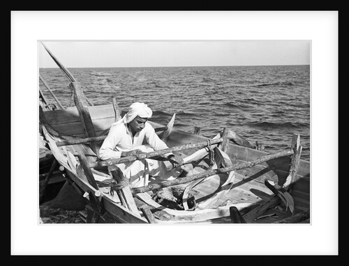 Carpenter building a small jalboot by Alan Villiers