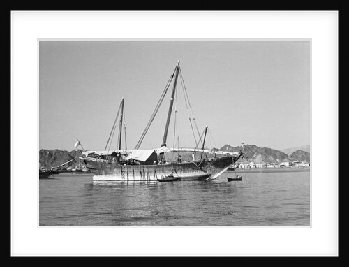 A large baggala in Mutrah harbour by Alan Villiers