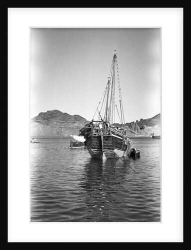 A small Yemeni sambuk lies at anchor, Ma'alla by Alan Villiers