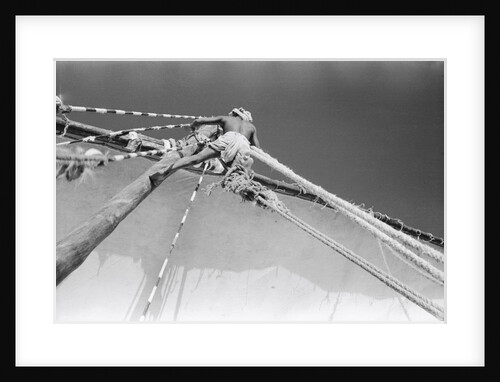 Man up aloft on the 'Sheikh Mansur' by Alan Villiers