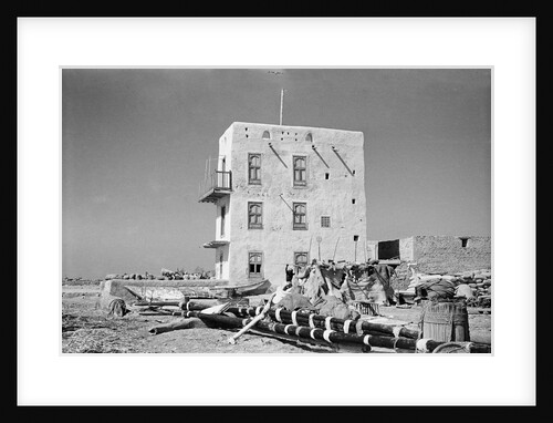 Three-storey building and boatyard, Jizan by Alan Villiers