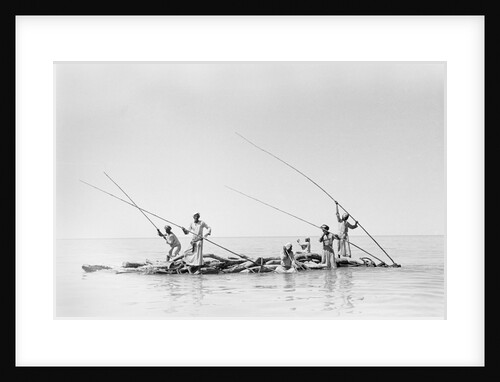 Imported ship-building timbers were poled from dhow to boatyard by Alan Villiers