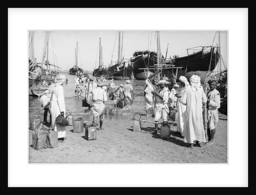 Water carriers filling their cans by Alan Villiers