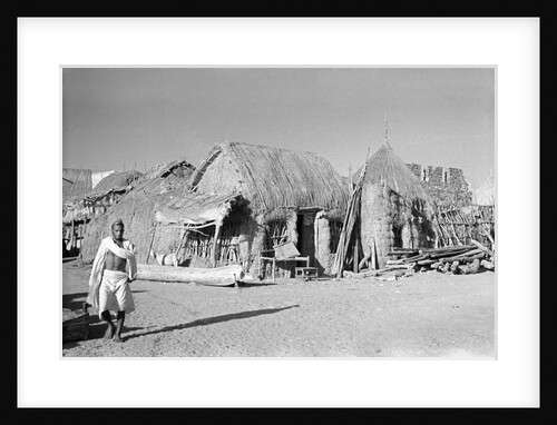 Jizan market with 'ushshah' houses by Alan Villiers